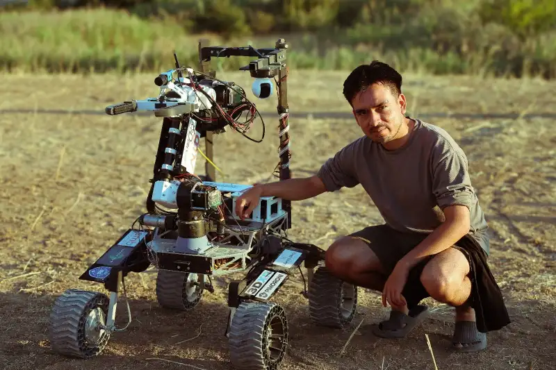 Renzo Damian with the Marsworks rover at the Anatolian Rover Challenge